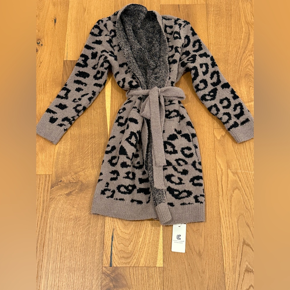 NWT. Ruthie Grace Wrap Sweater. I don’t see a size. Animal print.